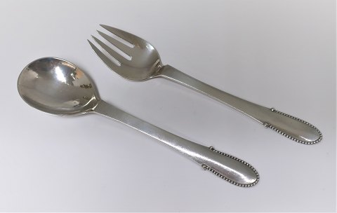Georg Jensen. Sølvbestik.Kugle.  Sterling (925). Salatsæt. Længde 21,7 cm.