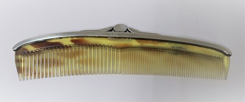 Georg Jensen. Comb with silver mounting. Sterling (925). Model 224. Length 19.5 
cm.