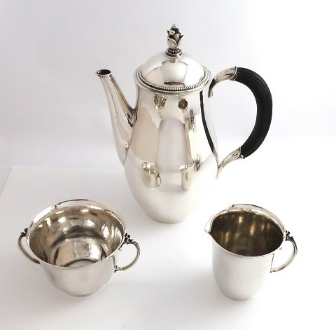 Georg Jensen. Sterling (925). Coffee service. Design Harald Nielsen. Model 456. 
Consisting of coffeepot (456A), creamer (456D) and sugar bowl(456D). Produced 
1945 - 1951