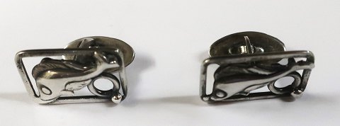 Silver cufflinks (830) with fish motif. Length 21 mm.