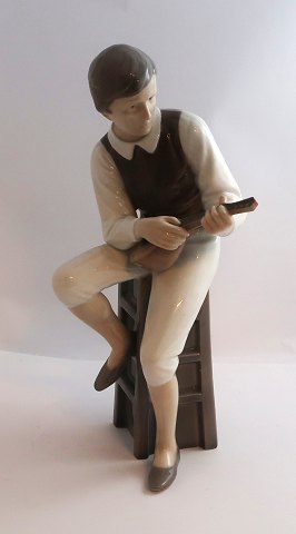 Bing & Gröndahl. Porcelain figure. Mandolin player. Model 1600. Height 28.5 cm. 
(1 quality).