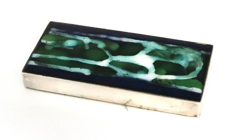 Michelsen. Sterling silver paperweight with enamel (925). Inger Hanmann. Length 
13.2 cm. Width 6 cm.