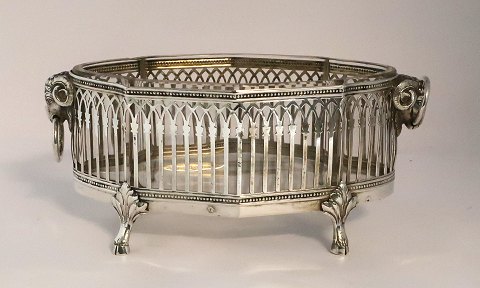 Silver bowl with glass insert (800). Handle with ram