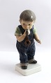 Dahl Jensen. Porcelain figure. Boy with pipe. Model 1027. Height 17 cm. (1 
quality)