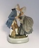 Royal Copenhagen. Porcelain figure. The kiss. Design: Chr. Thomas. Model 2046. 
Height 22 cm. (1 quality).