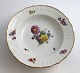 Royal Copenhagen. Saxon flower. Deep dessert plate. Model #1616. Diameter 22 cm. 
Produced before 1923.