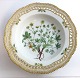 Royal Copenhagen. Flora danica. Deep plate with openwork edge. Diameter 24.5 cm. 
Model 3547. (1 quality). Potentilla verna L