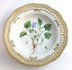 Royal Copenhagen. Flora danica. Deep plate with openwork edge. Diameter 24.5 cm. 
Model 3547. (1 quality). Viola silvatica Fr