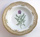 Royal Copenhagen. Flora danica. Deep plate with openwork edge. Diameter 24.5 cm. 
Model 3547. (1 quality). Astragalus danicus Retz