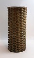 Royal Copenhagen. Aksel Salto. Cylindrical stoneware vase with knobbed style. 
Height 21 cm.