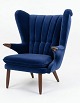 Stunning, newly upholstered Svend Skipper "Teddy Bear" chair in exquisite blue fabric. Teak buttons and legs.